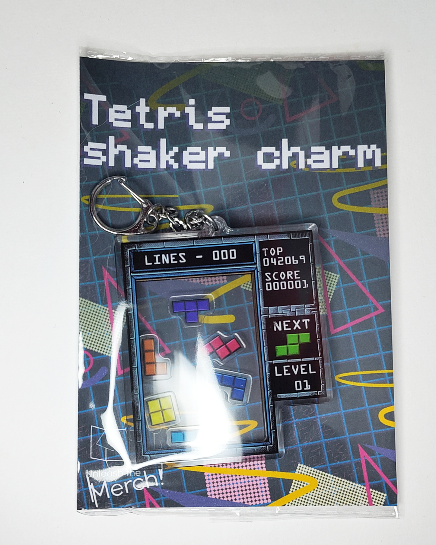 Tetris Shaker Charm - double-sided acrylic keychain with Tetrominos inside