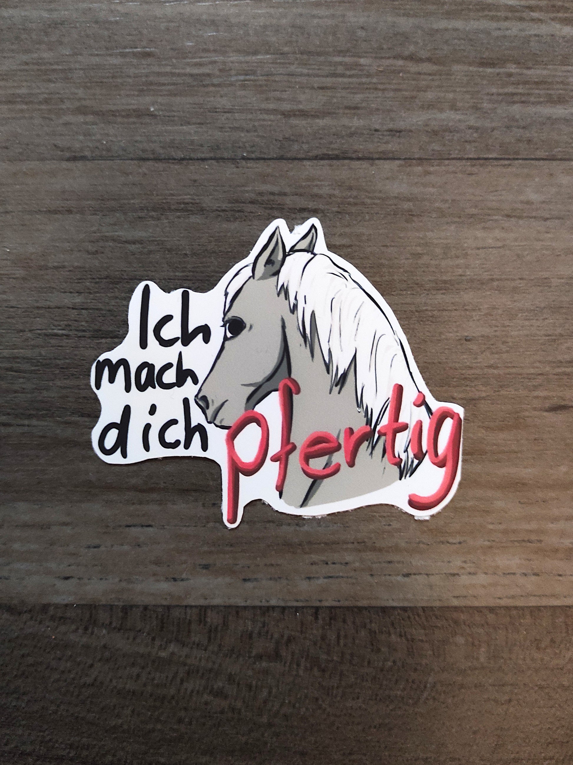 Sticker of a horse with text on a wooden surface, pferd, Pferdesticker, Aufkleber