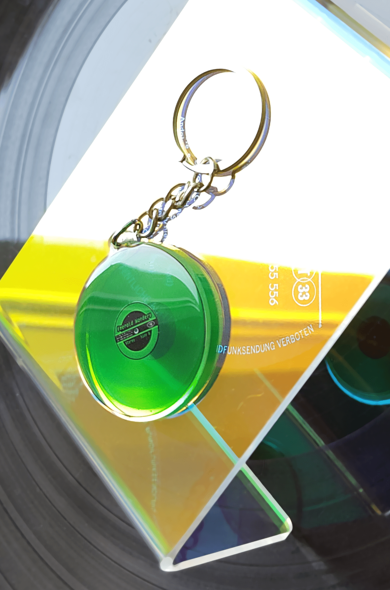 Colored Vinyls: Emerald Wonders - double sided acrylic keychain - Acrylic Charm - Unleash The Merch!