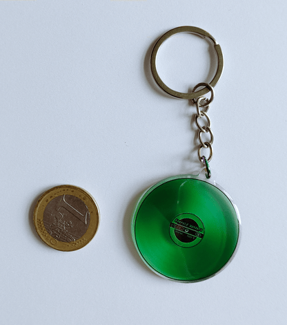 Colored Vinyls: Emerald Wonders - double sided acrylic keychain - Acrylic Charm - Unleash The Merch!