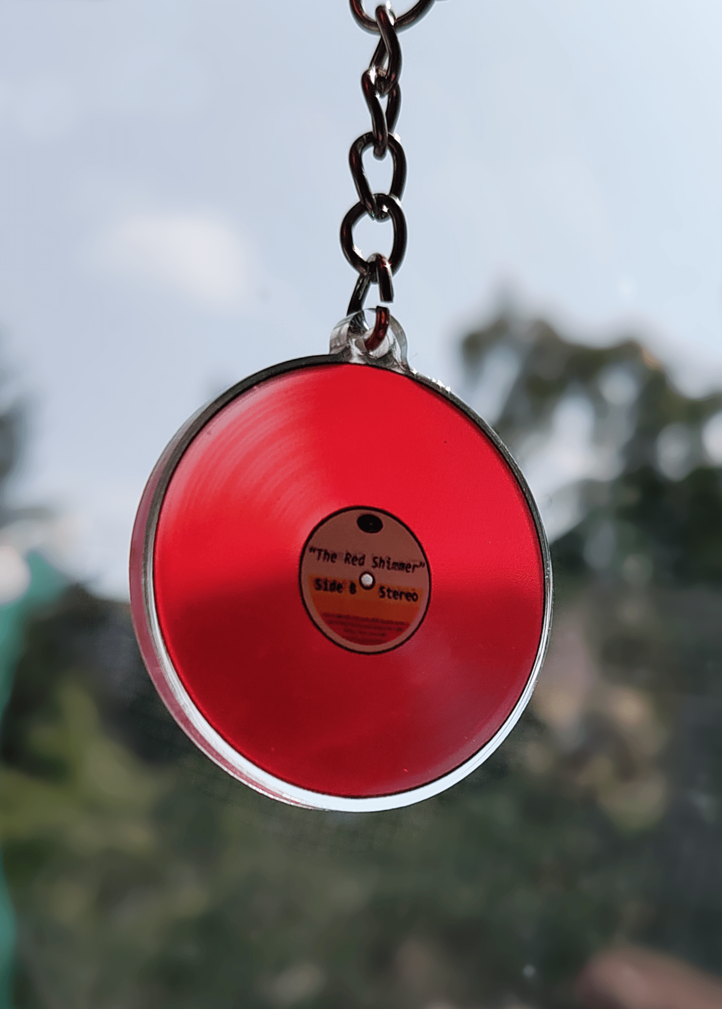 Colored Vinyls: The Red Shimmer - double sided acrylic keychain - Acrylic Charm - Unleash The Merch!